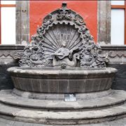 Picture Of Fountain Depicting A Mermaid Playing A Guitar